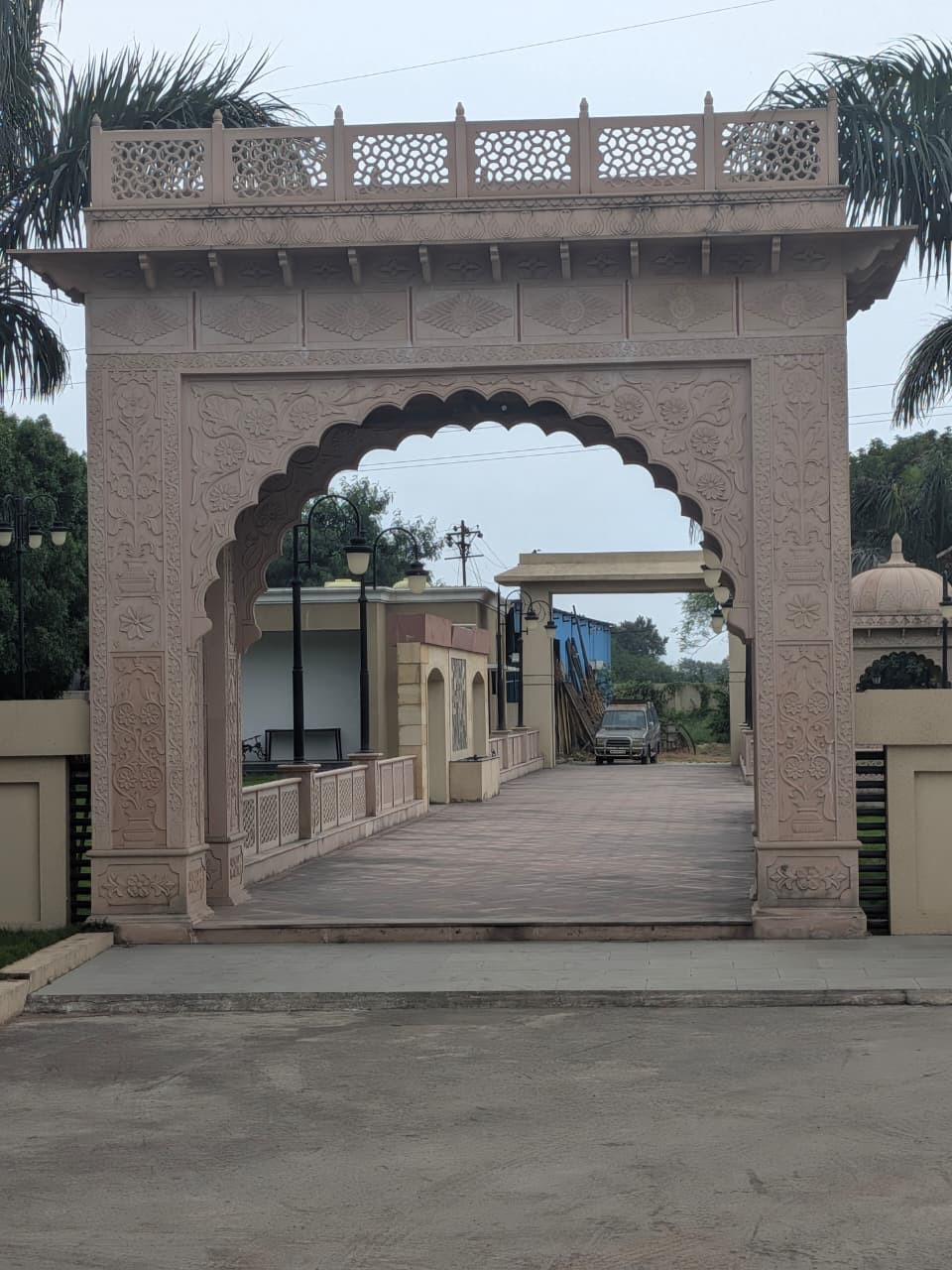 Carved sandstone entrance gateway of The Royal Courtyard on Nagpur Road, Chandrapur